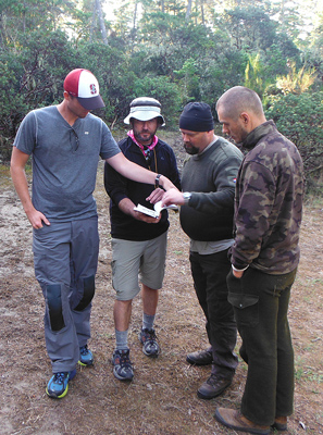 students and instructor discuss plant identification