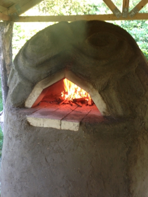 firing up the cob oven