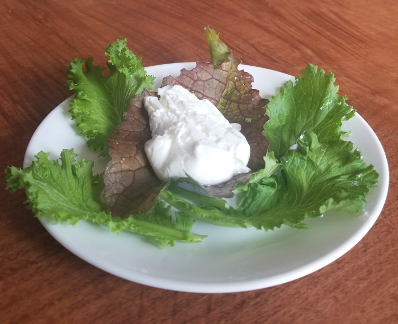 home-made cheese on lettuce