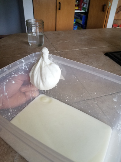 straining milk curds