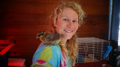baby chicken on Leah's shoulder