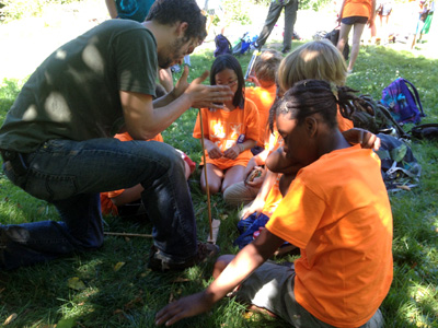 demonstrating handdrill to kids