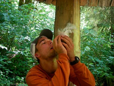 blowing coal to a flame