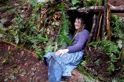 student trying out the debris hut student trying out the debris hut